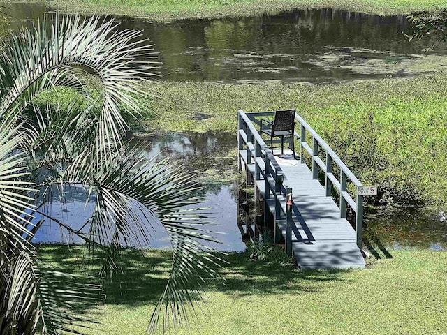 view of dock with a water view