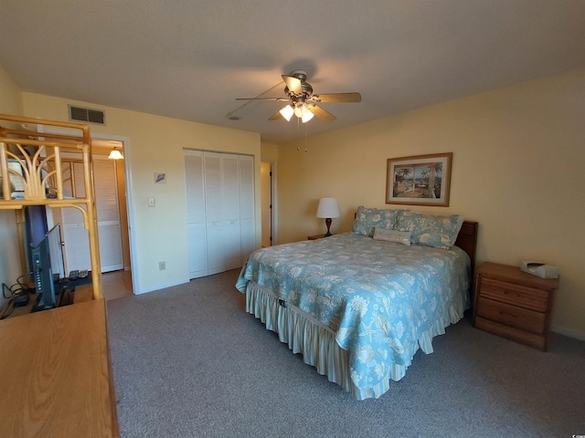 bedroom with dark carpet and ceiling fan