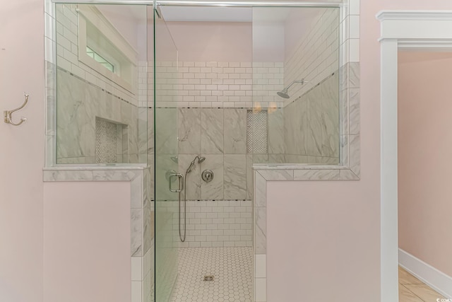 bathroom featuring an enclosed shower