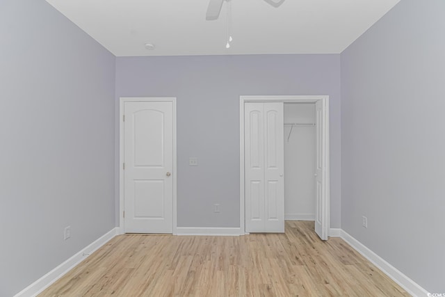 unfurnished bedroom with a closet, ceiling fan, and light hardwood / wood-style flooring