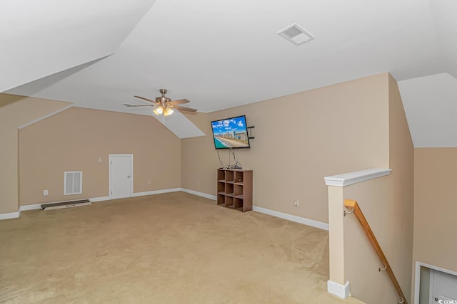 bonus room with lofted ceiling, light colored carpet, and ceiling fan