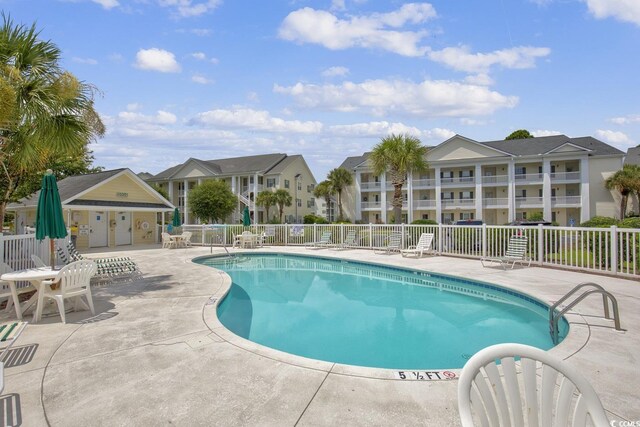 view of pool with a patio