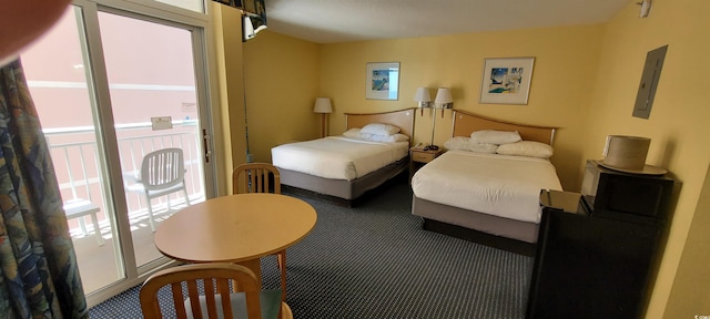2701 S Ocean Blvd Unit 1410, North Myrtle Beach, SC 29582 - carpeted bedroom with electric panel and access to outside