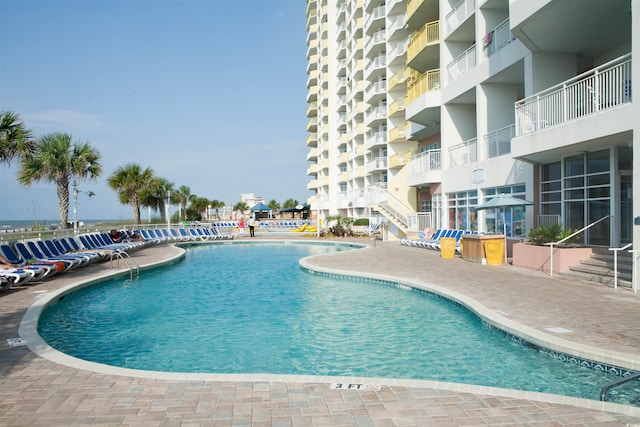 view of pool with a patio area