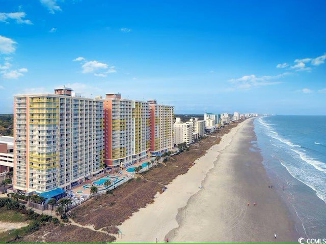 aerial view with a view of the beach and a water view