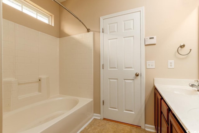 bathroom with vanity and bathing tub / shower combination