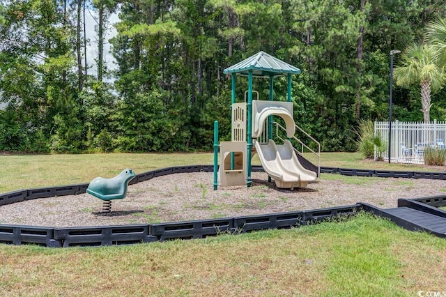 view of playground with a yard