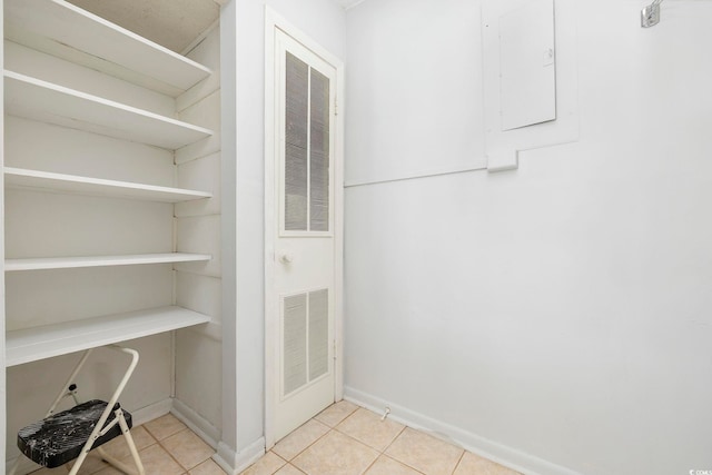 pantry with visible vents and a heating unit