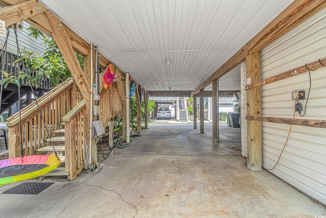 view of patio / terrace with a carport