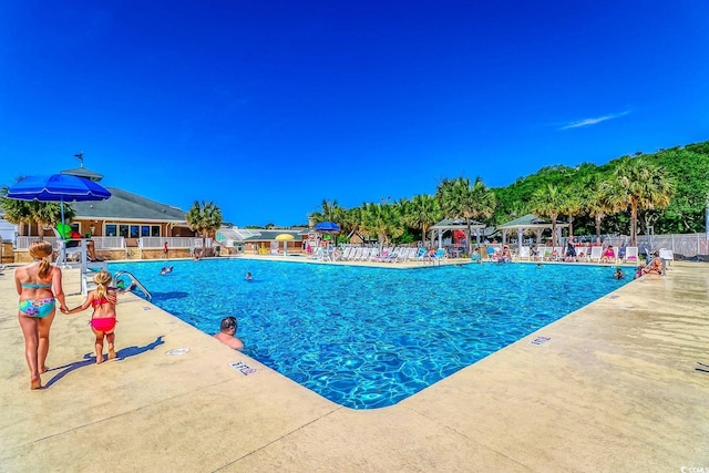 view of pool with a gazebo and a patio