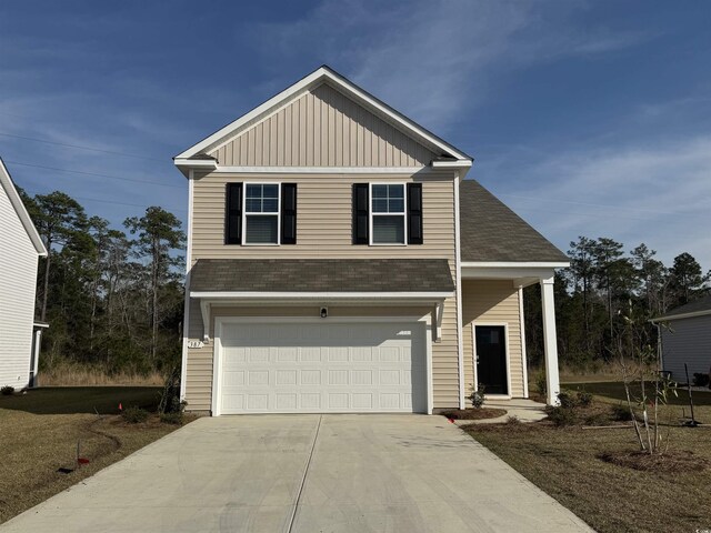 view of front of property featuring a garage