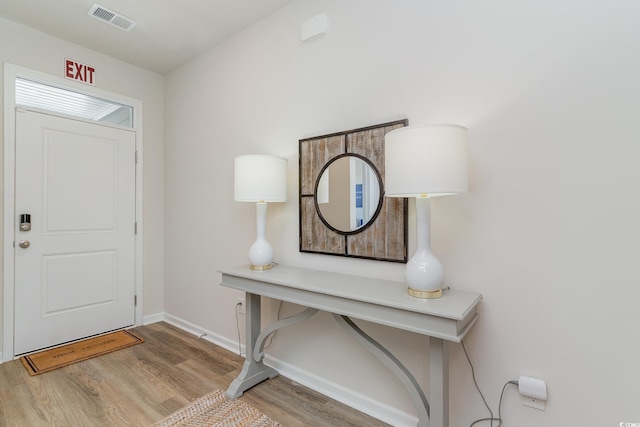 foyer entrance featuring light hardwood / wood-style flooring