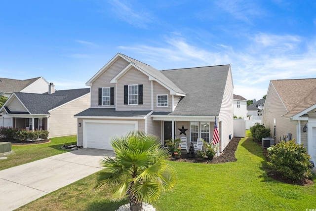 view of front facade with cooling unit, covered porch, a front yard, and a garage