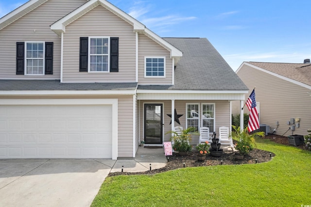 view of front of house featuring central air condition unit, a front yard, a porch, and a garage