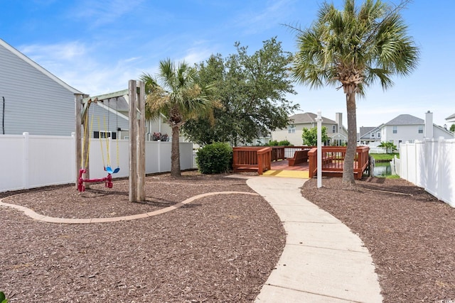 view of yard with a wooden deck