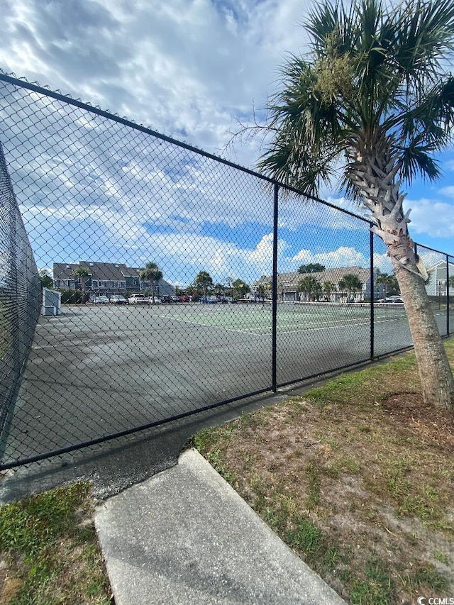 1880 Colony Dr Unit 10-H, Surfside Beach, SC 29575 - view of tennis court with fence