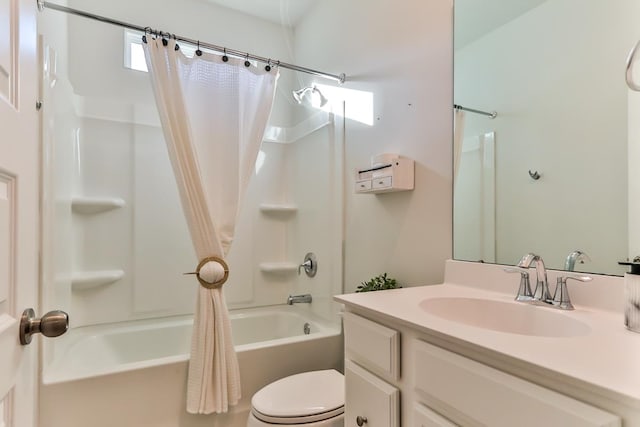 full bathroom featuring vanity, shower / tub combo, and toilet