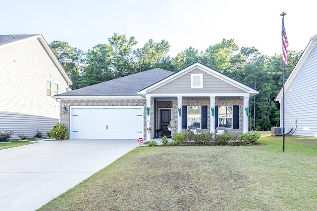 view of front of property featuring a garage, central AC unit, and a front yard