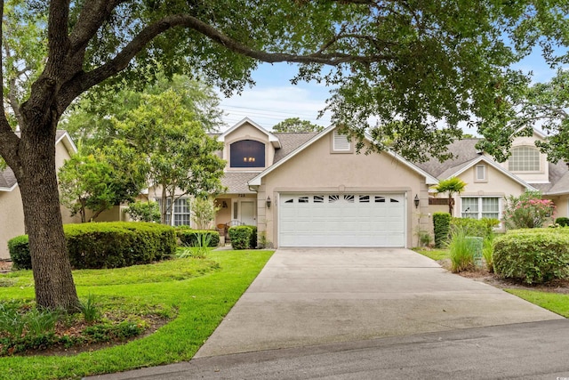 view of front of property with a garage