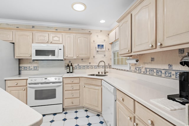 kitchen featuring sink, crown molding, light tile patterned floors, white appliances, and light brown cabinetry