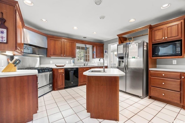 kitchen featuring a kitchen island with sink, black appliances, wall chimney exhaust hood, ornamental molding, and light tile patterned floors