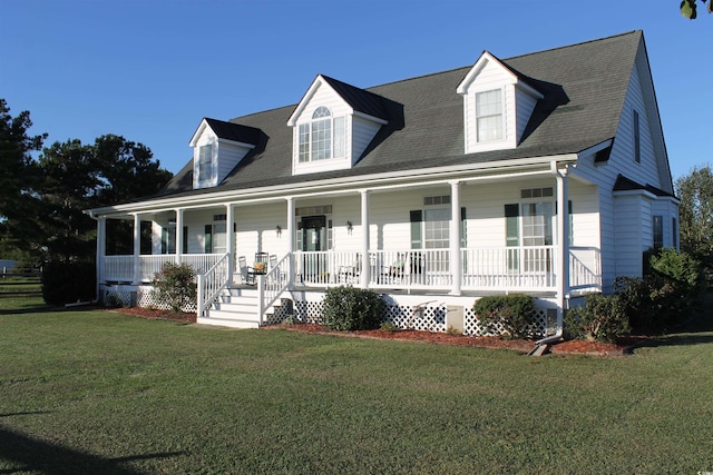 1409 Arbor Rd, Loris, SC 29569 - cape cod house featuring covered porch and a front lawn