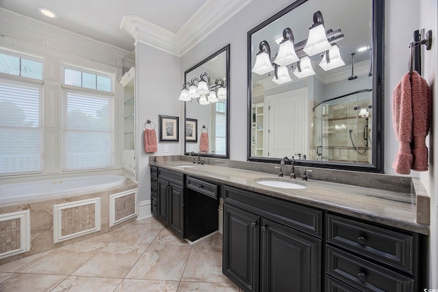 bathroom featuring ornamental molding, vanity, and separate shower and tub