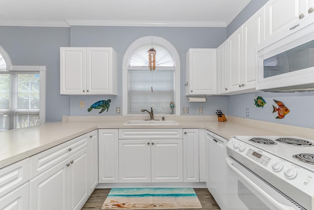 kitchen featuring sink, white cabinetry, dark hardwood / wood-style floors, and white appliances