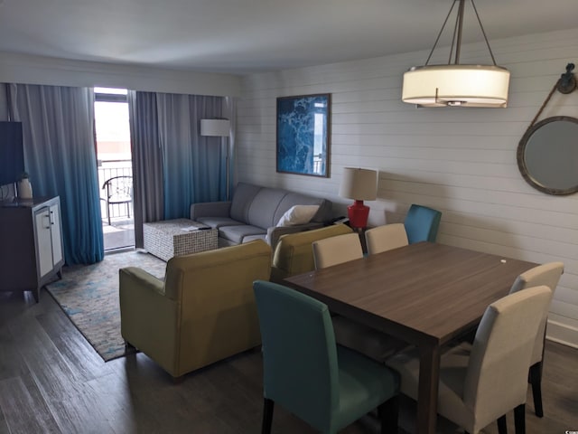 dining room with dark wood-type flooring