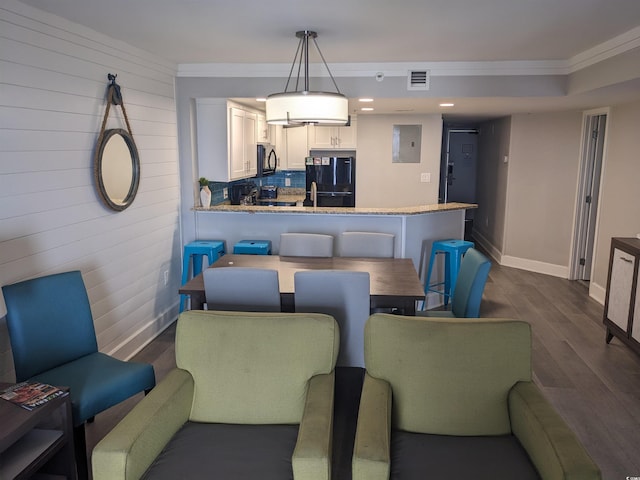 dining room featuring dark wood-type flooring