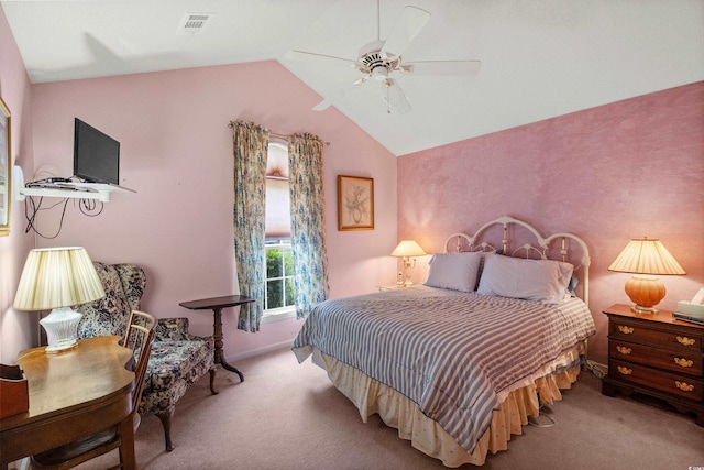 bedroom featuring ceiling fan, vaulted ceiling, and light colored carpet