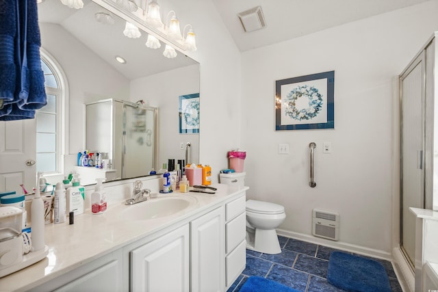 bathroom with vanity, tile patterned floors, an enclosed shower, lofted ceiling, and toilet