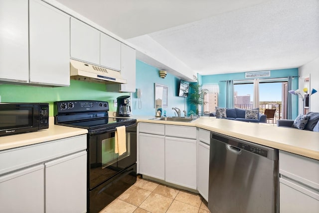 kitchen featuring black appliances, light countertops, under cabinet range hood, and a sink