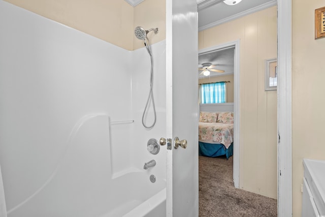 bathroom featuring ornamental molding, vanity, shower / tub combination, and ceiling fan