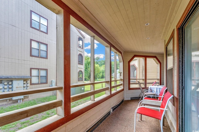 sunroom / solarium with wooden ceiling