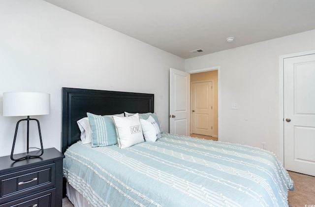 bedroom featuring carpet