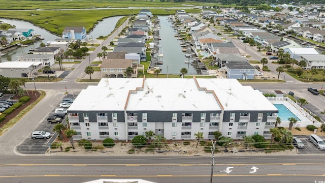 drone / aerial view with a water view