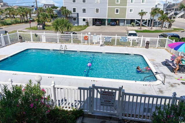 view of pool featuring a patio area