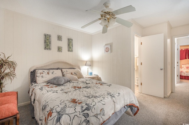 bedroom with ceiling fan and carpet floors