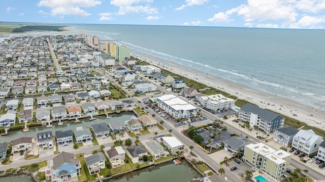 aerial view featuring a water view and a view of the beach