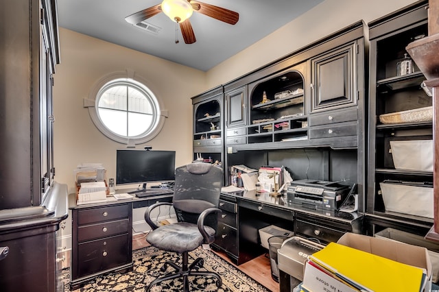 home office featuring ceiling fan and hardwood / wood-style floors