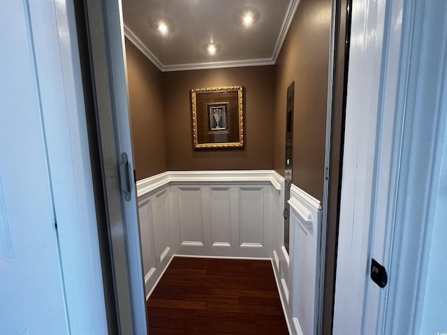 interior space featuring dark wood-type flooring, elevator, and ornamental molding