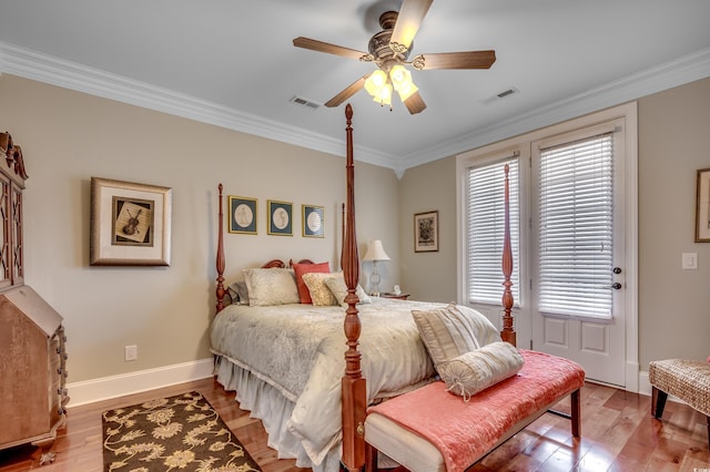 bedroom featuring ceiling fan, light hardwood / wood-style floors, and ornamental molding