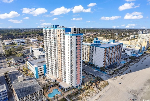 birds eye view of property with a city view