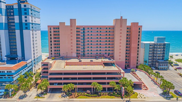 view of building exterior with a water view