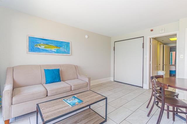 living room with light tile patterned floors