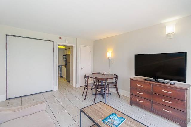 living room featuring light tile patterned flooring