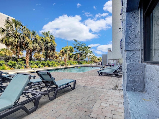 view of pool featuring a patio