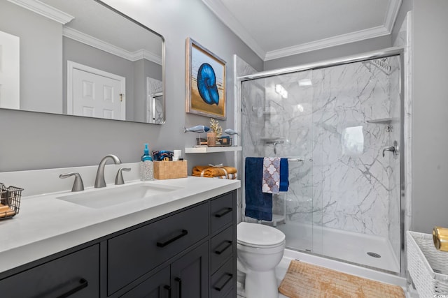 bathroom with walk in shower, crown molding, vanity, and toilet
