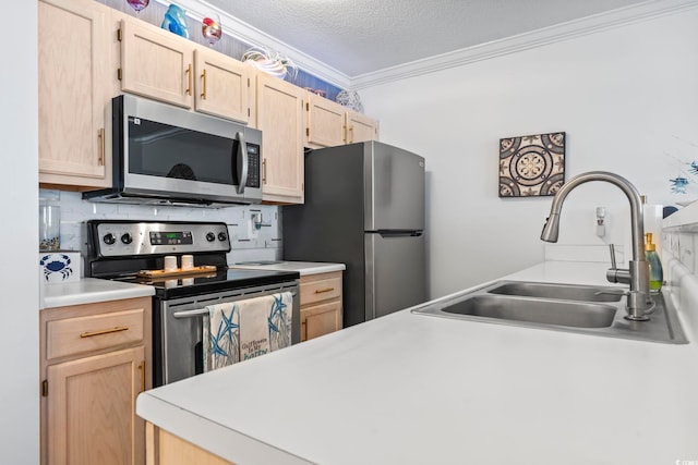 kitchen featuring light brown cabinets, stainless steel appliances, sink, crown molding, and a textured ceiling